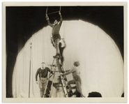 10" x 8" Glossy Photo From 1934 With Curly, Moe & Larry in a Stage Appearance -- Label on Verso Reads "The Stooges reprise their acrobatic act…" -- Very Good Condition